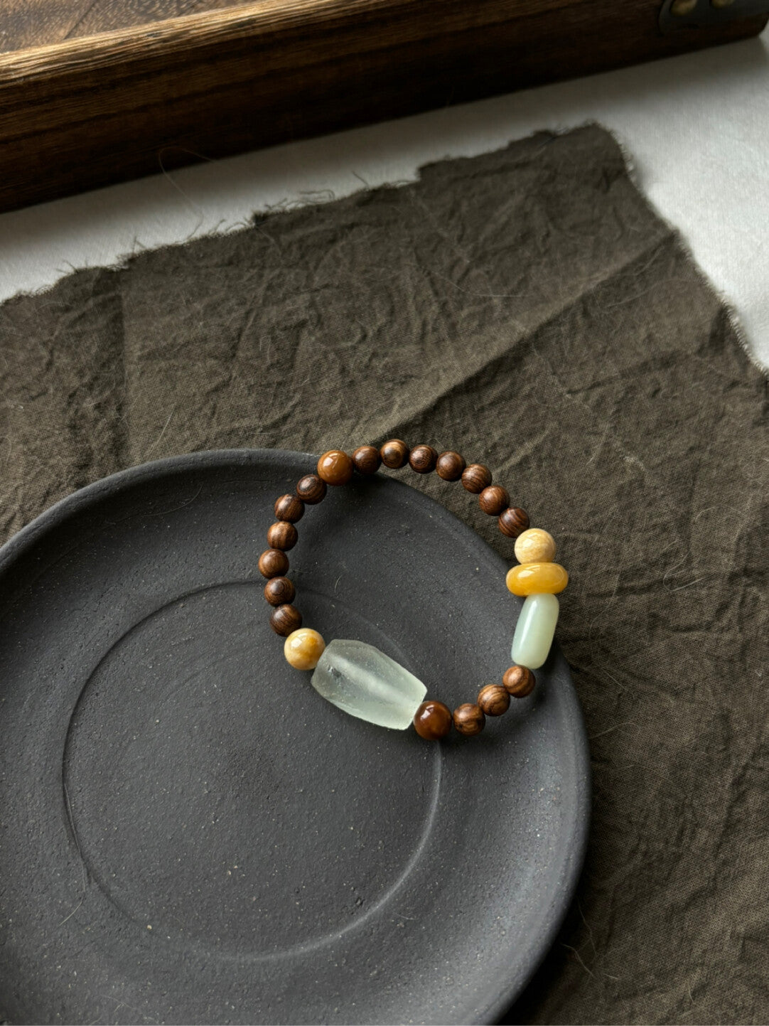 桔青 晚荷｜原创天然石金丝檀木太阳石老琉璃手串